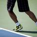 Japanese resident Masato Shimizu's shoes during a serve in the Ann Arbor City Tennis Tournament on Sunday, July 14. Daniel Brenner I AnnArbor.com